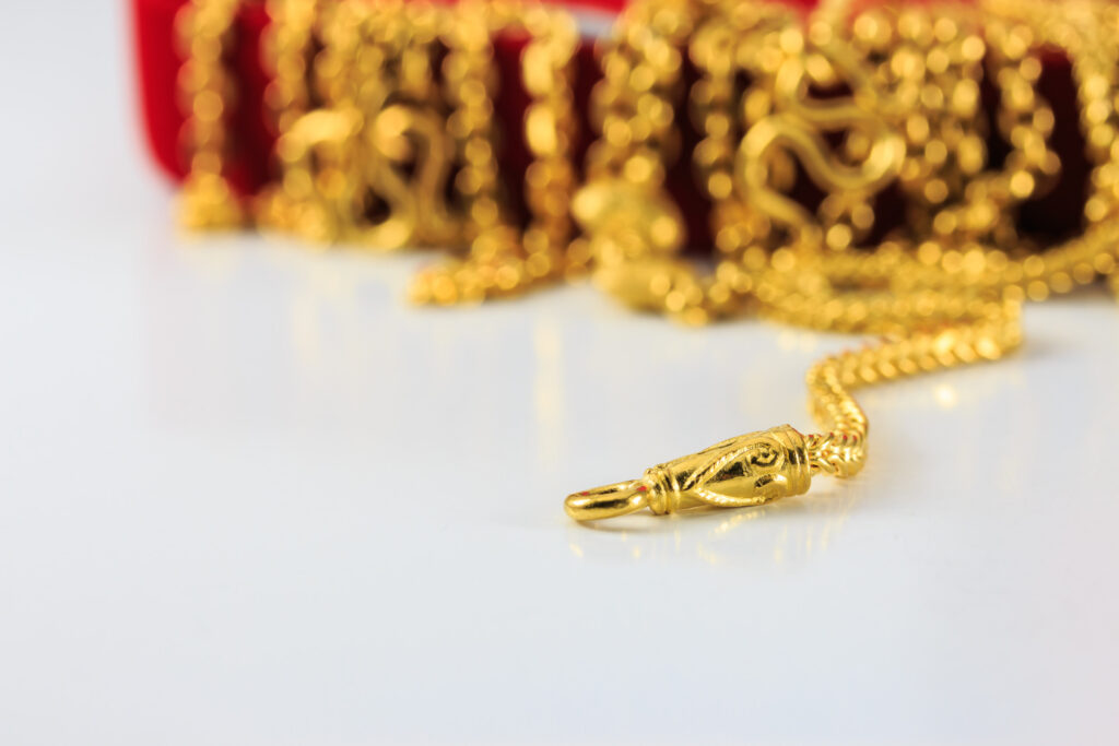 Group of gold necklace and gold bracelet