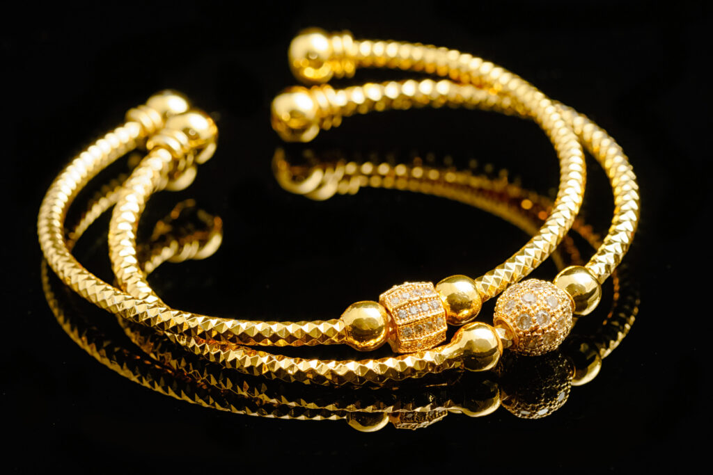 Jewelry and bracelets on black background